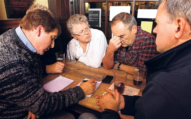 Pub quiz night with teams competing at tables